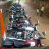 One of the lot of Royal Enfield bikes in parking while riders are inside the monument.