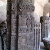 A carved pillar inside the establishment, probably from ruin of temple.