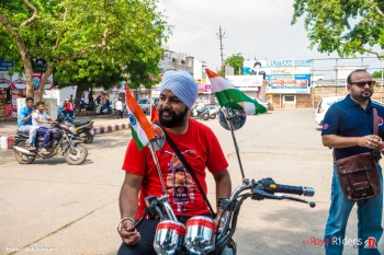 Harshpal Posing for camera  on his Bike.