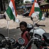 A kid in front of Royal Enfield