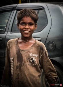 An under-privileged kid at Hariparwat Crossing, Agra.